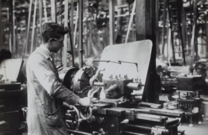 man working at the factory workstation